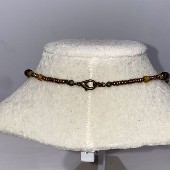 Vintage Boho Beaded Necklace with Drop Dangle Caged Bead Brown and Gold Accents - Picture 5 of 11